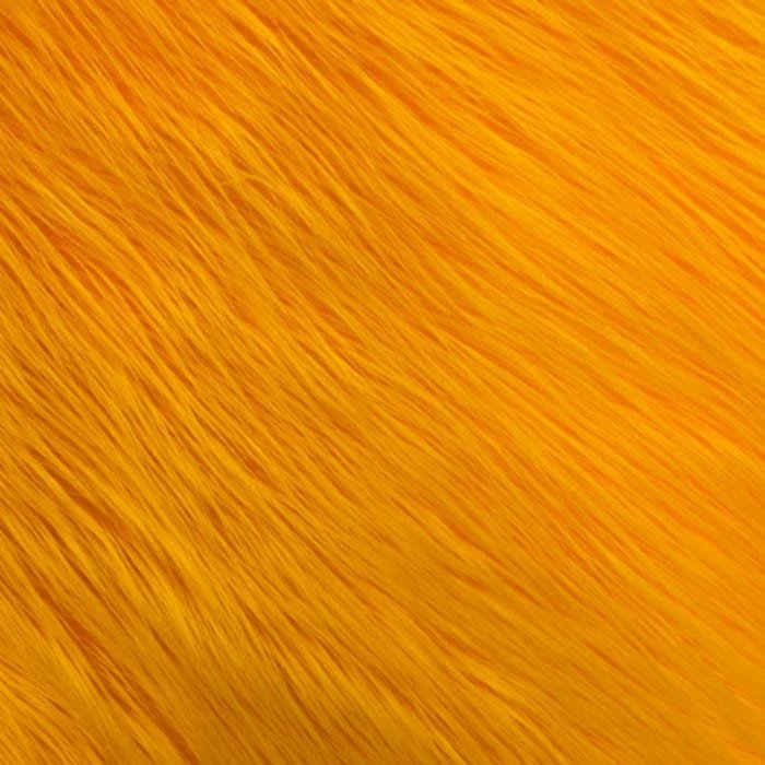 Muestra de tela peluche color naranja fuerte, textura de pelo.