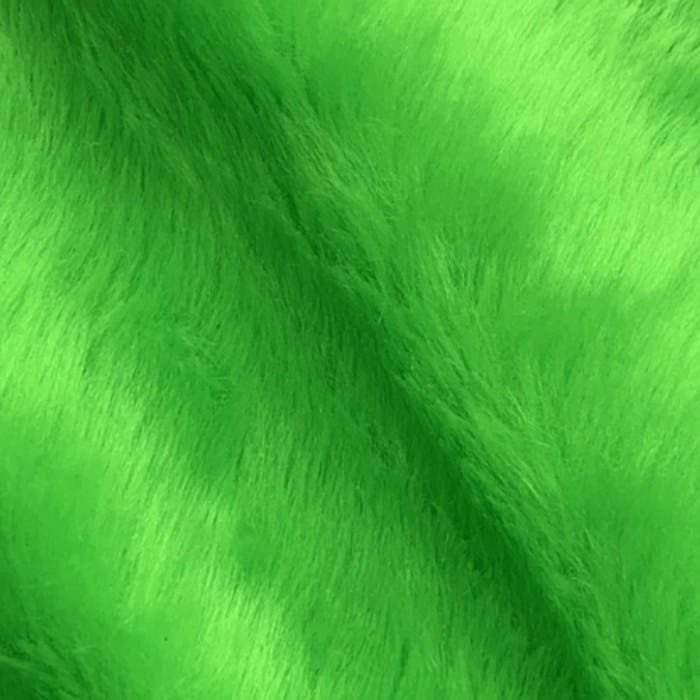 Muestra de tela peluche color verde lima, textura de pelo.